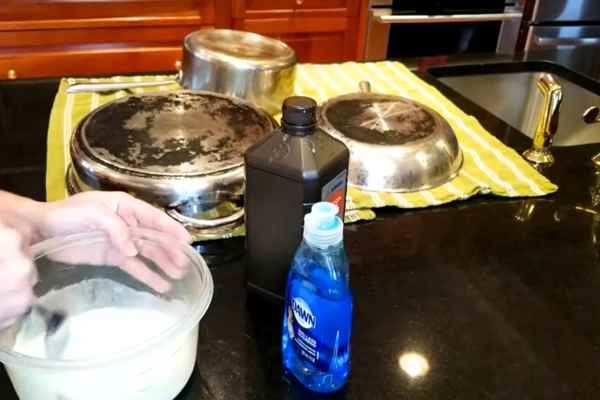 Applying Dish Soap for clean Pots And Pans