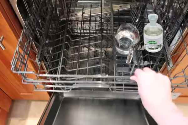 Pour Vinegar Into A Dishwasher-Safe Bowl Or Cup