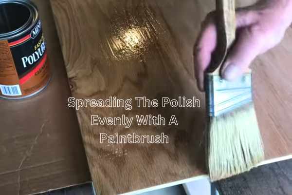 Spreading The Polish Evenly With A Paintbrush