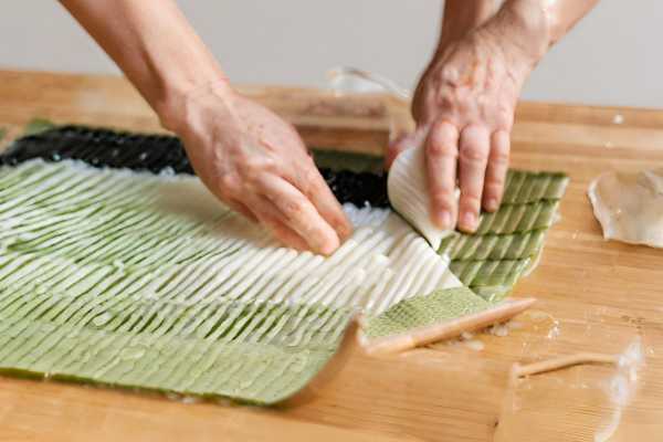 Wetting The Sushi Mat