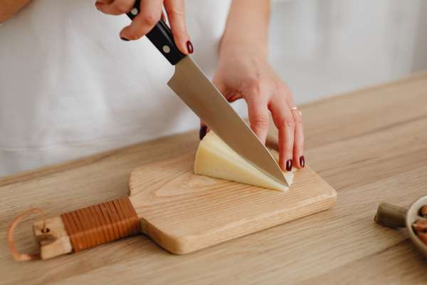 Tools And Equipment Cut Cheese For A Charcuterie Board