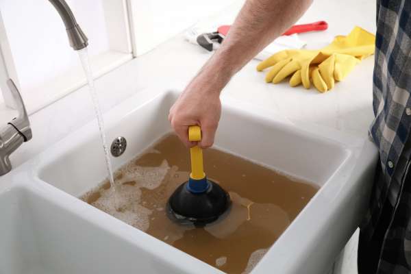 Remove The P-Trap To Unclog The Drain How To Unclog A Kitchen Sink With Standing Water