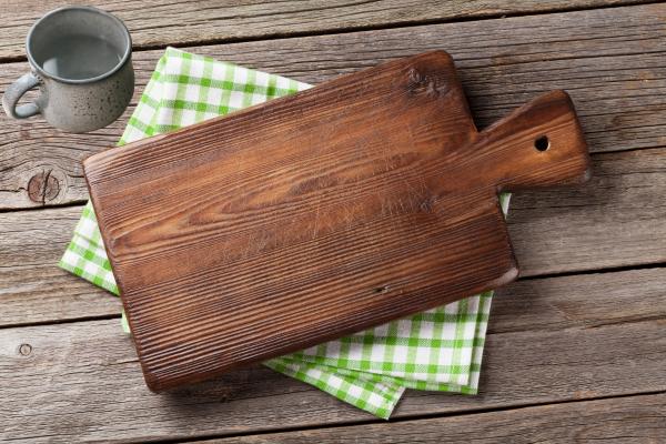 Rinse The Cutting Board With Hot Water