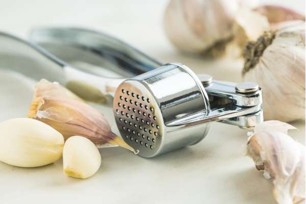 Using A Rocker Garlic Press