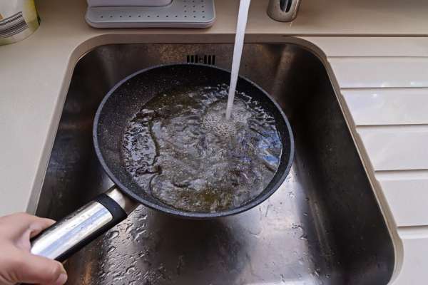 Utilizing Boiling Water To Dissolve Grease